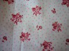 /album/fotogallerij/roze-rode-bloemen-op-witte-gestippelde-achtergrond-jpg/